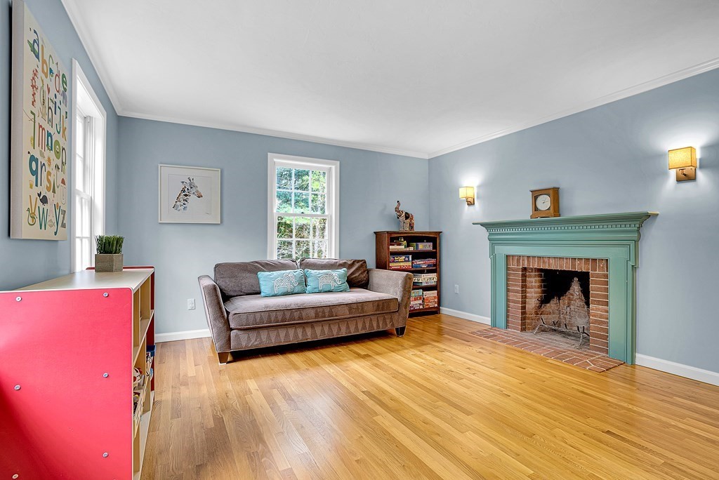 41 South Street Upton, MA 01568 - Photo 15 of 41 a living room with furniture and a fireplace