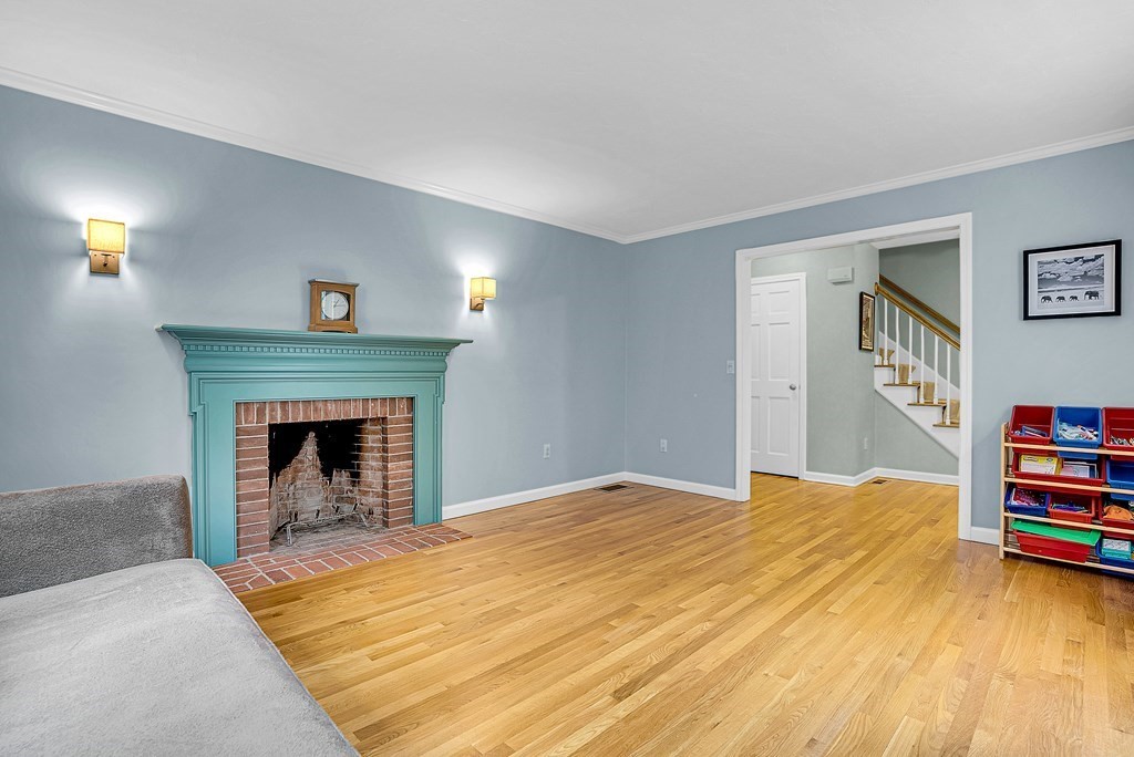 41 South Street Upton, MA 01568 - Photo 16 of 41 a bedroom with a bed and a fireplace