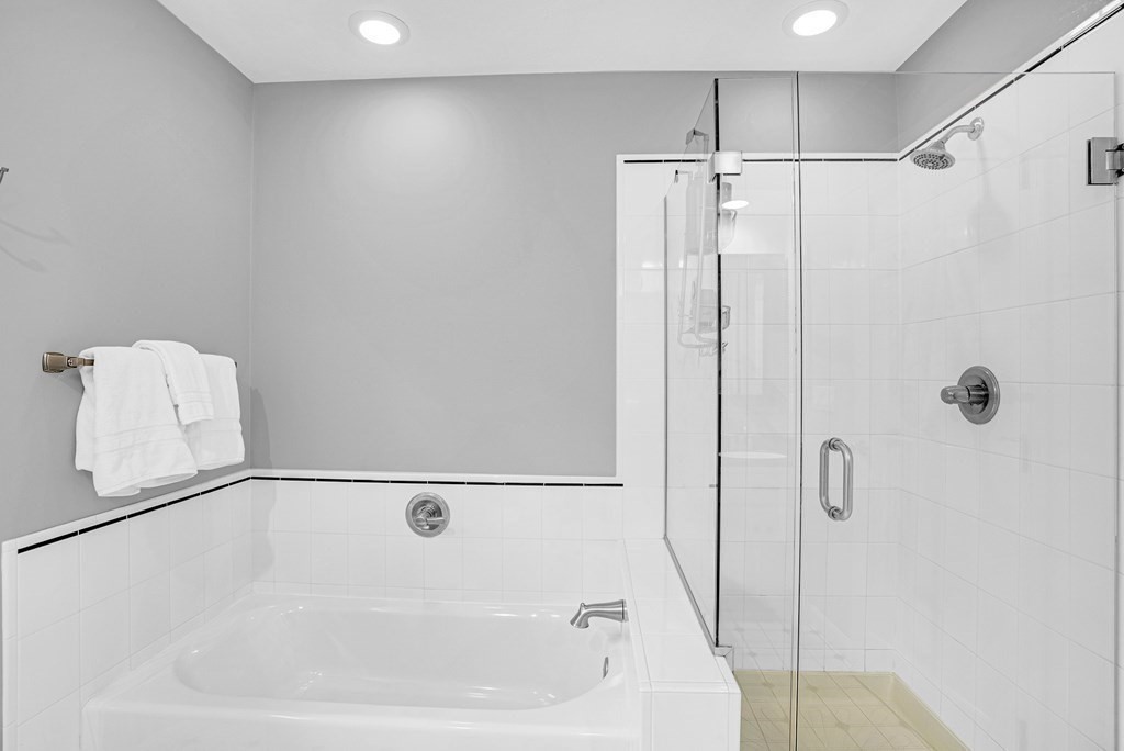 41 South Street Upton, MA 01568 - Photo 24 of 41 a bathroom with a bathtub and a shower