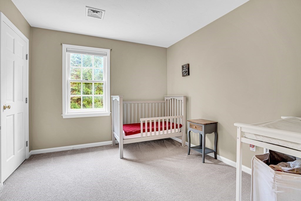 41 South Street Upton, MA 01568 - Photo 28 of 41 a living room with furniture and a window