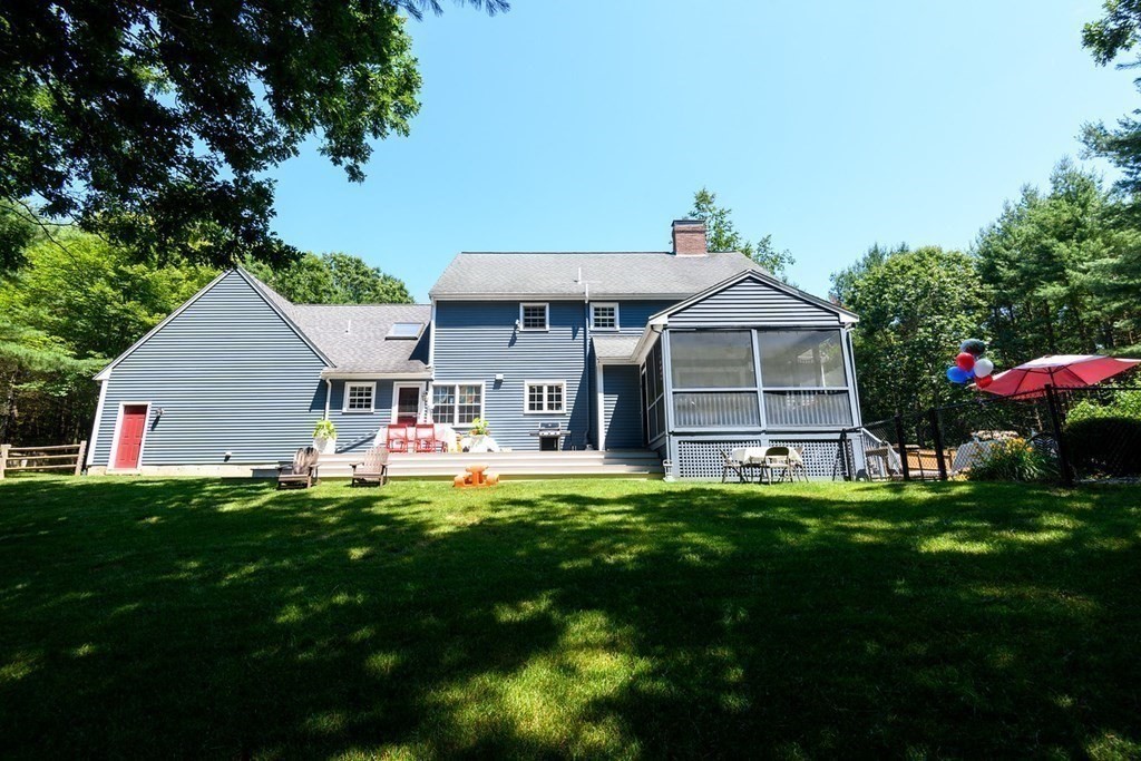 41 South Street Upton, MA 01568 - Photo 39 of 41 a front view of house with yard and green space