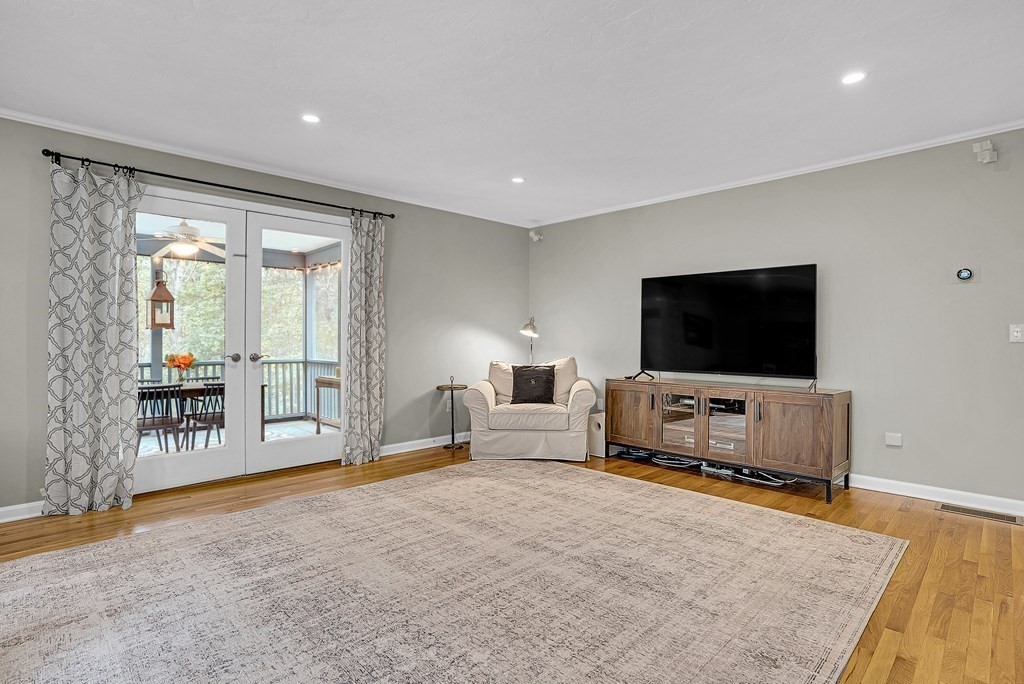 41 South Street Upton, MA 01568 - Photo 6 of 41 a living room with furniture and a flat screen tv