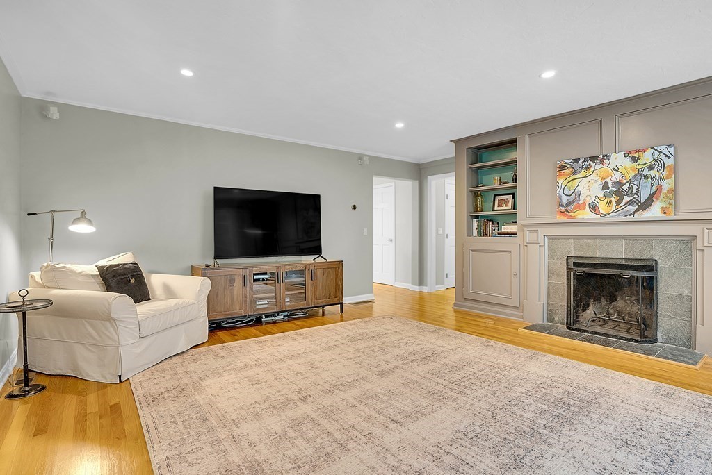 41 South Street Upton, MA 01568 - Photo 7 of 41 a living room with furniture and a flat screen tv