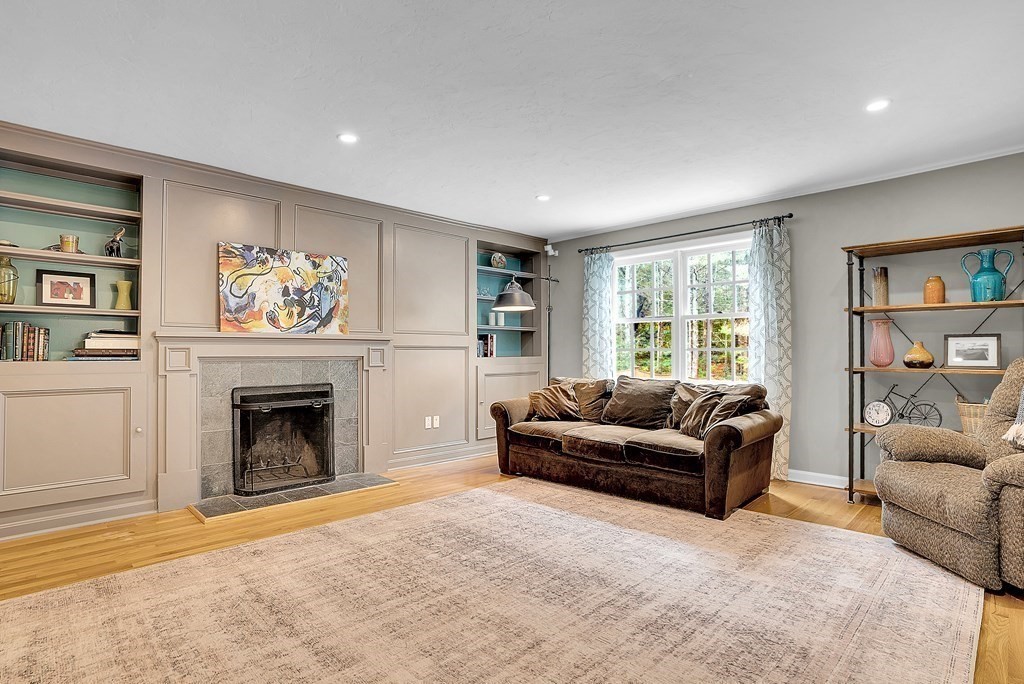 41 South Street Upton, MA 01568 - Photo 8 of 41 a living room with furniture window and a fireplace