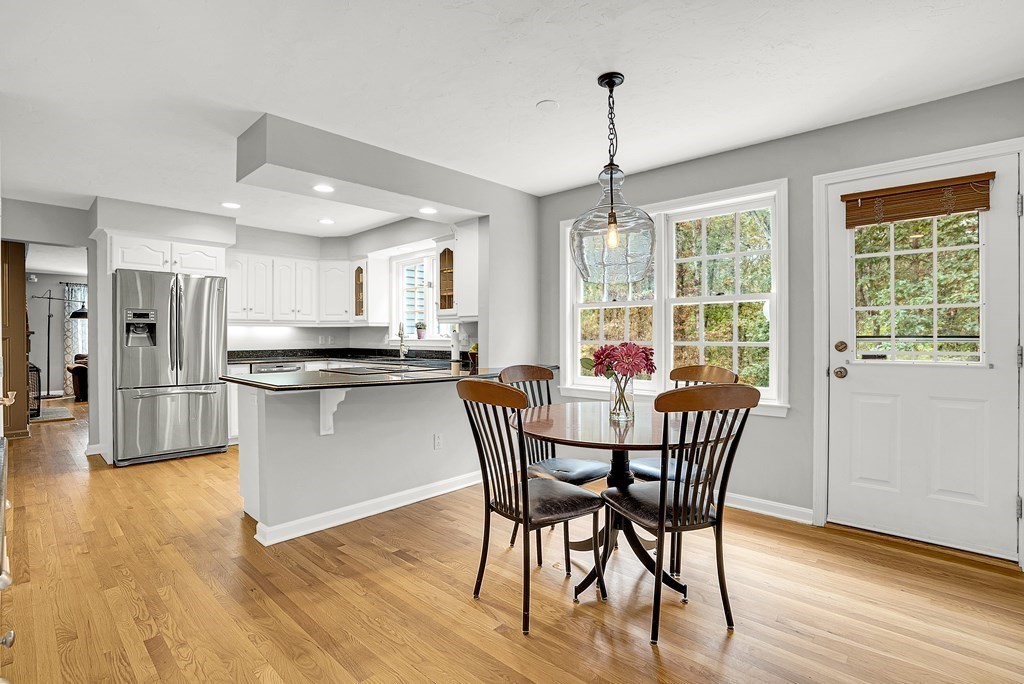 41 South Street Upton, MA 01568 - Photo 10 of 41 a dining room with furniture a chandelier and wooden floor