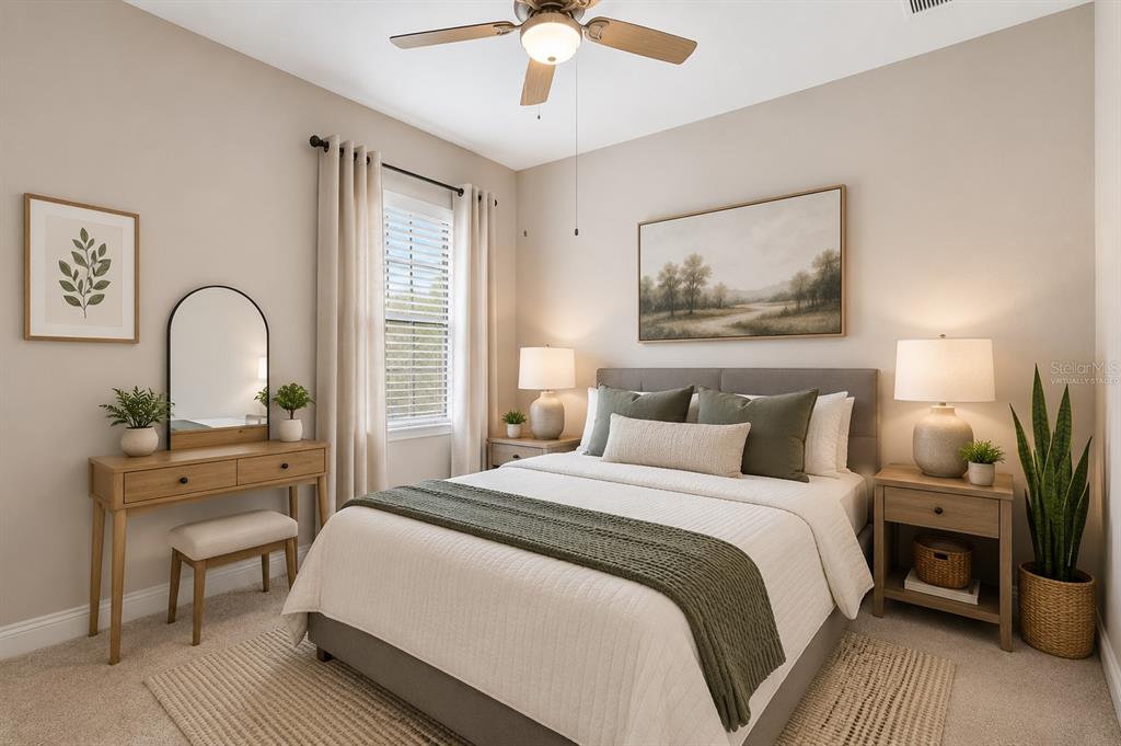 4300 Burdick Loop Odessa, FL 33556 - Photo 12 of 41 a bedroom with a bed and a potted plant