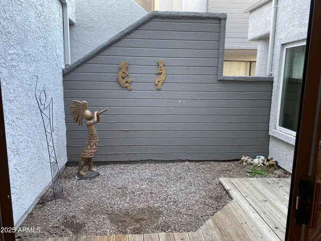 a view of a room with racks on the wall