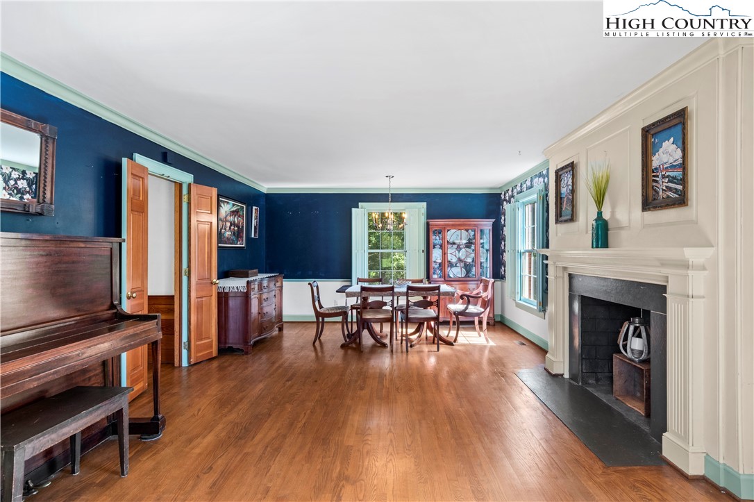 205 Hawthorne Road Elkin, NC 28621 - Photo 12 of 38 a living room with furniture and a fireplace