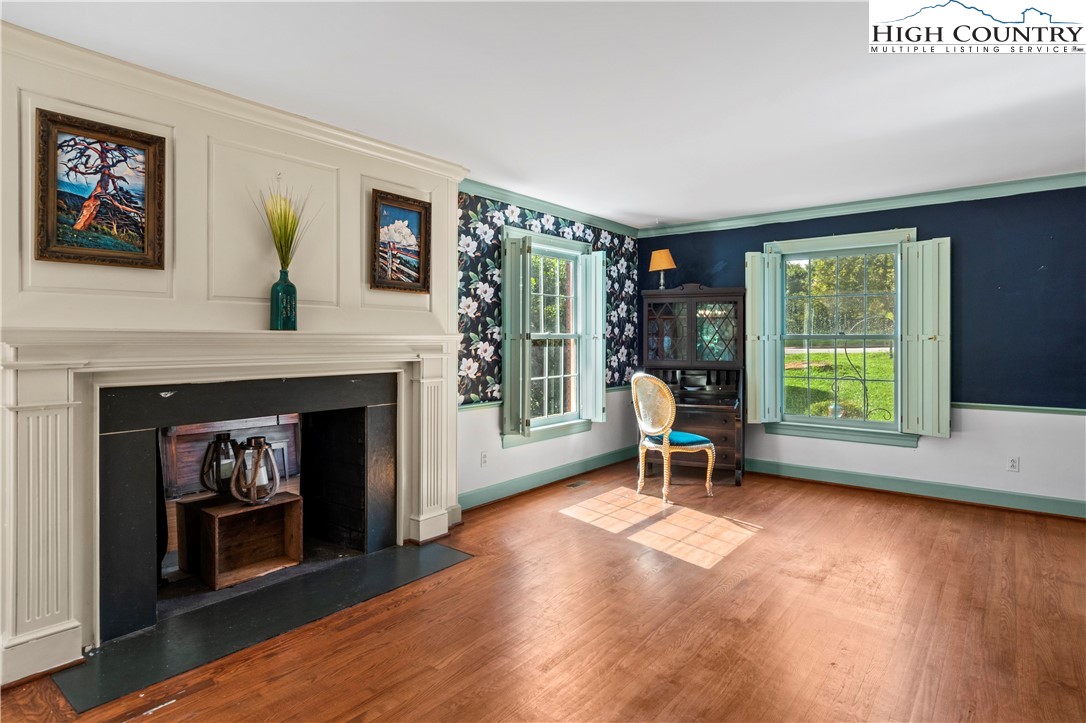 205 Hawthorne Road Elkin, NC 28621 - Photo 13 of 38 a living room with furniture and a fireplace