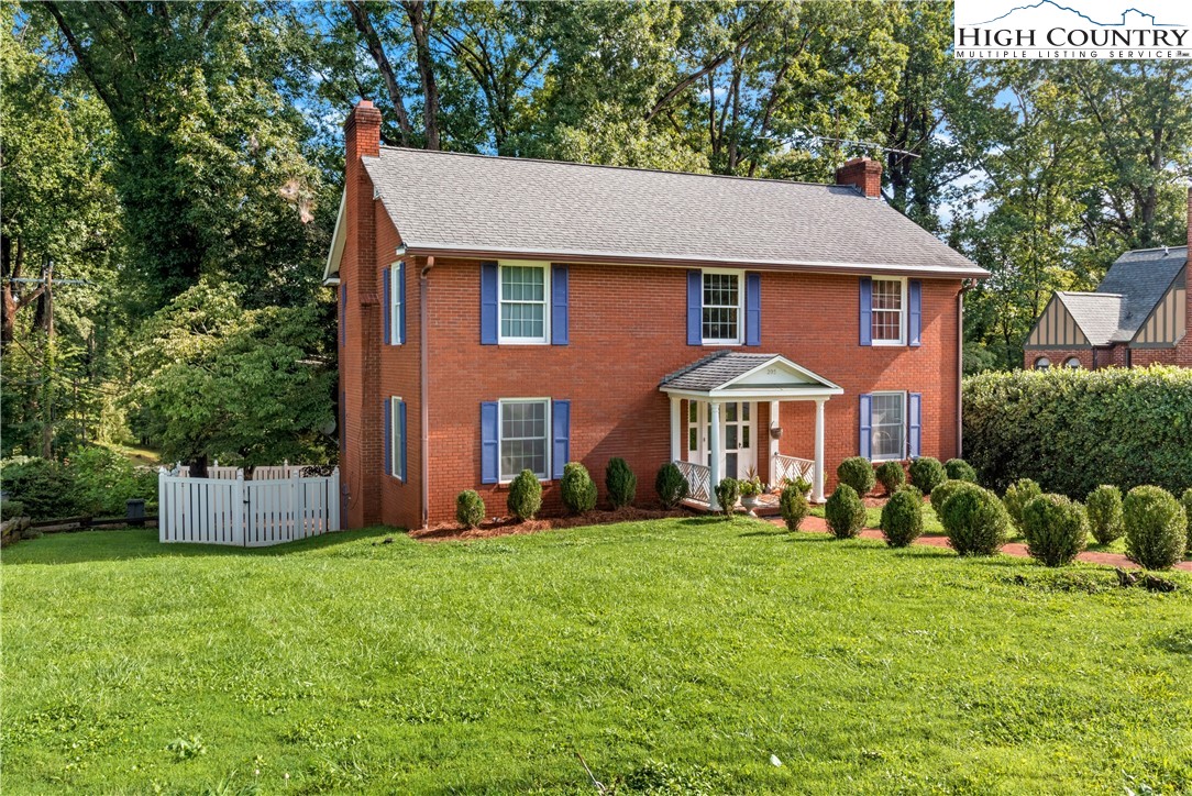 205 Hawthorne Road Elkin, NC 28621 - Photo 2 of 38 a front view of a house with a yard