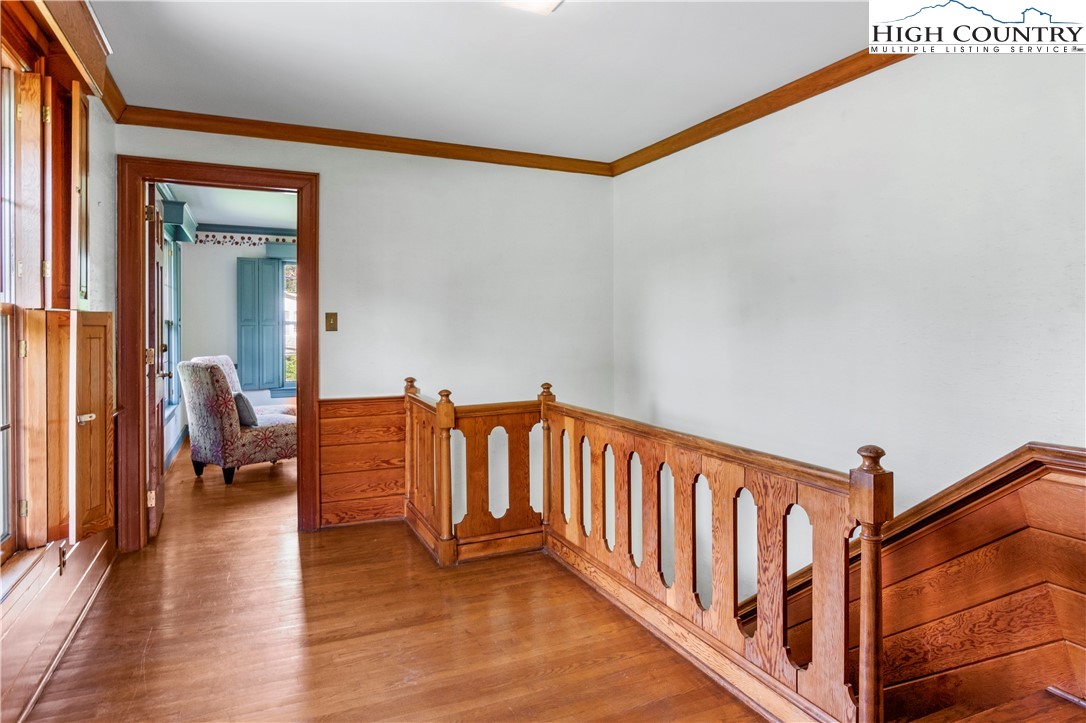 205 Hawthorne Road Elkin, NC 28621 - Photo 24 of 38 a view of a porch with wooden floor and windows