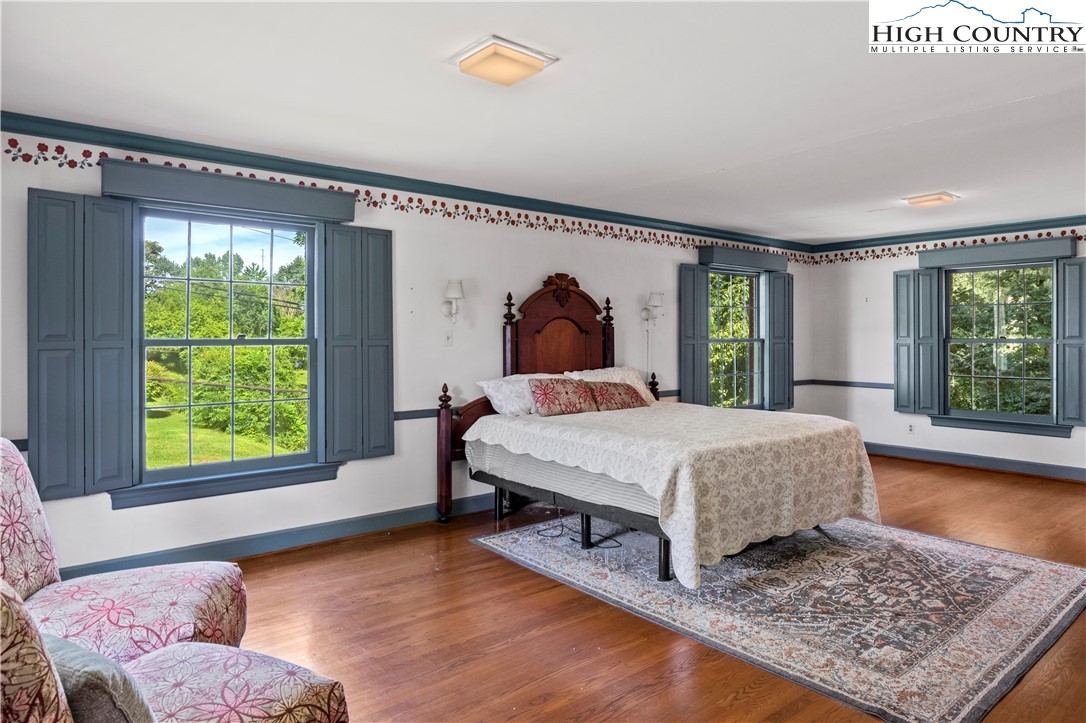 205 Hawthorne Road Elkin, NC 28621 - Photo 25 of 38 a bedroom with a bed and window