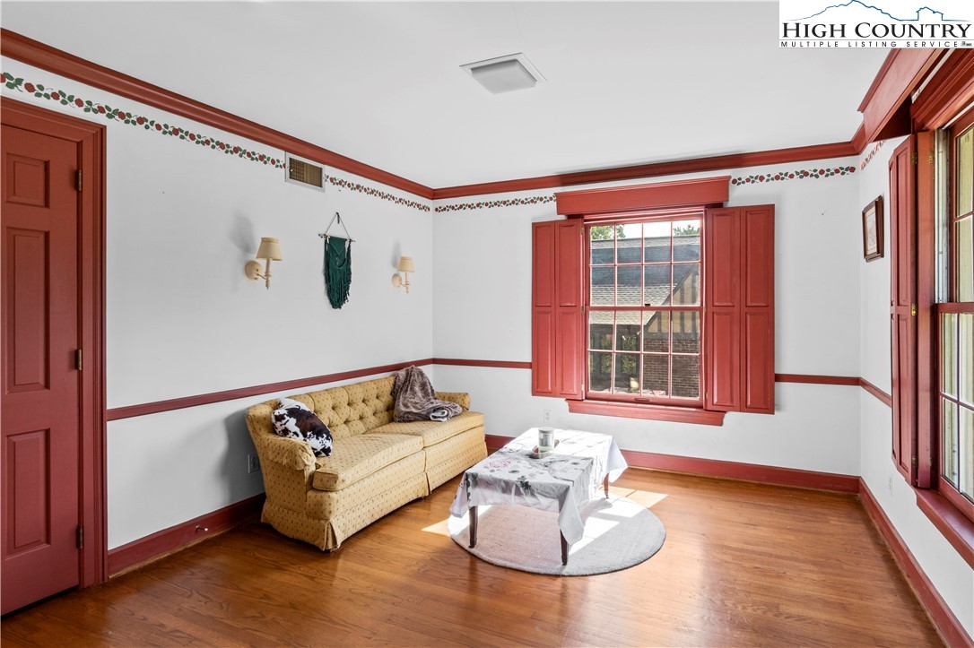 205 Hawthorne Road Elkin, NC 28621 - Photo 34 of 38 a bedroom with furniture and window