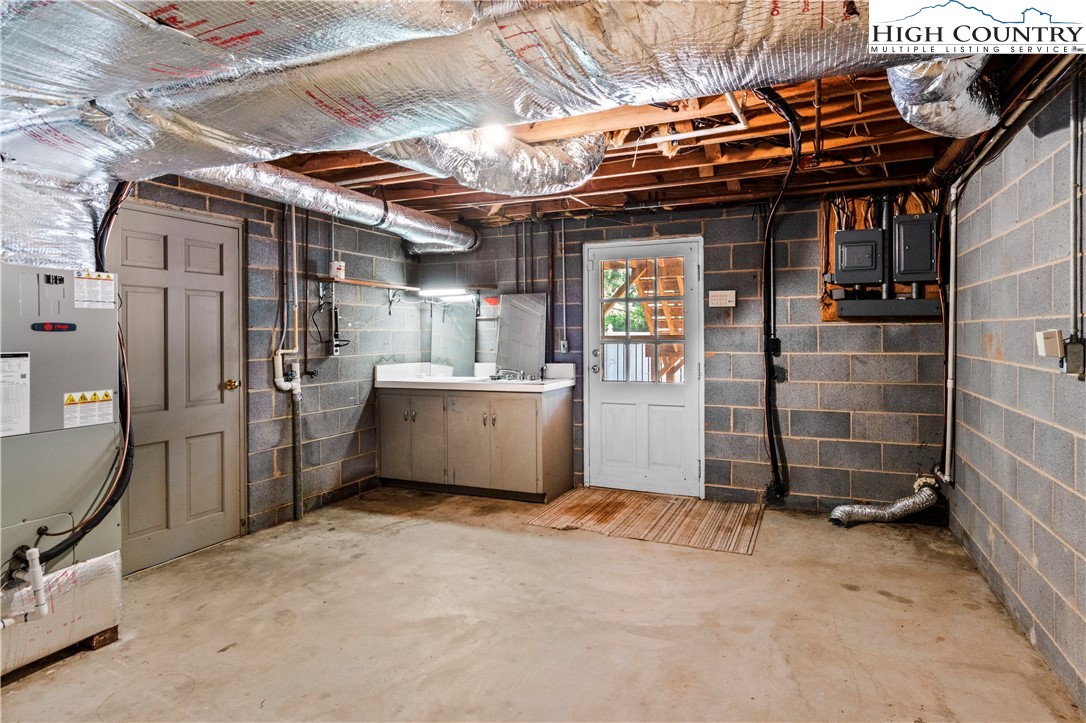 205 Hawthorne Road Elkin, NC 28621 - Photo 38 of 38 a view of storage and utility room