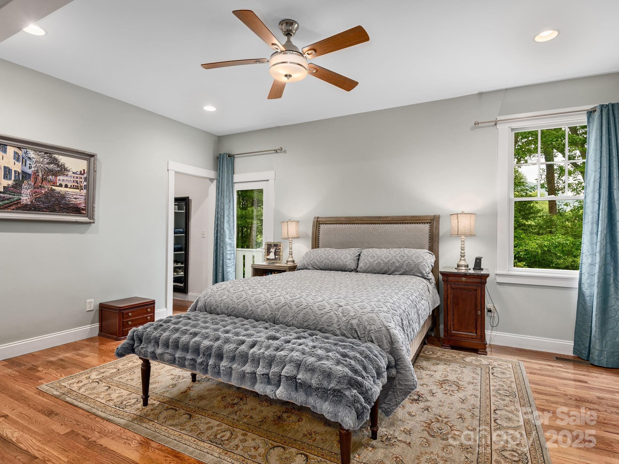 15 Avondale Road Asheville, NC 28803 - Photo 20 of 48 a bedroom with a bed painting on wall and a large window