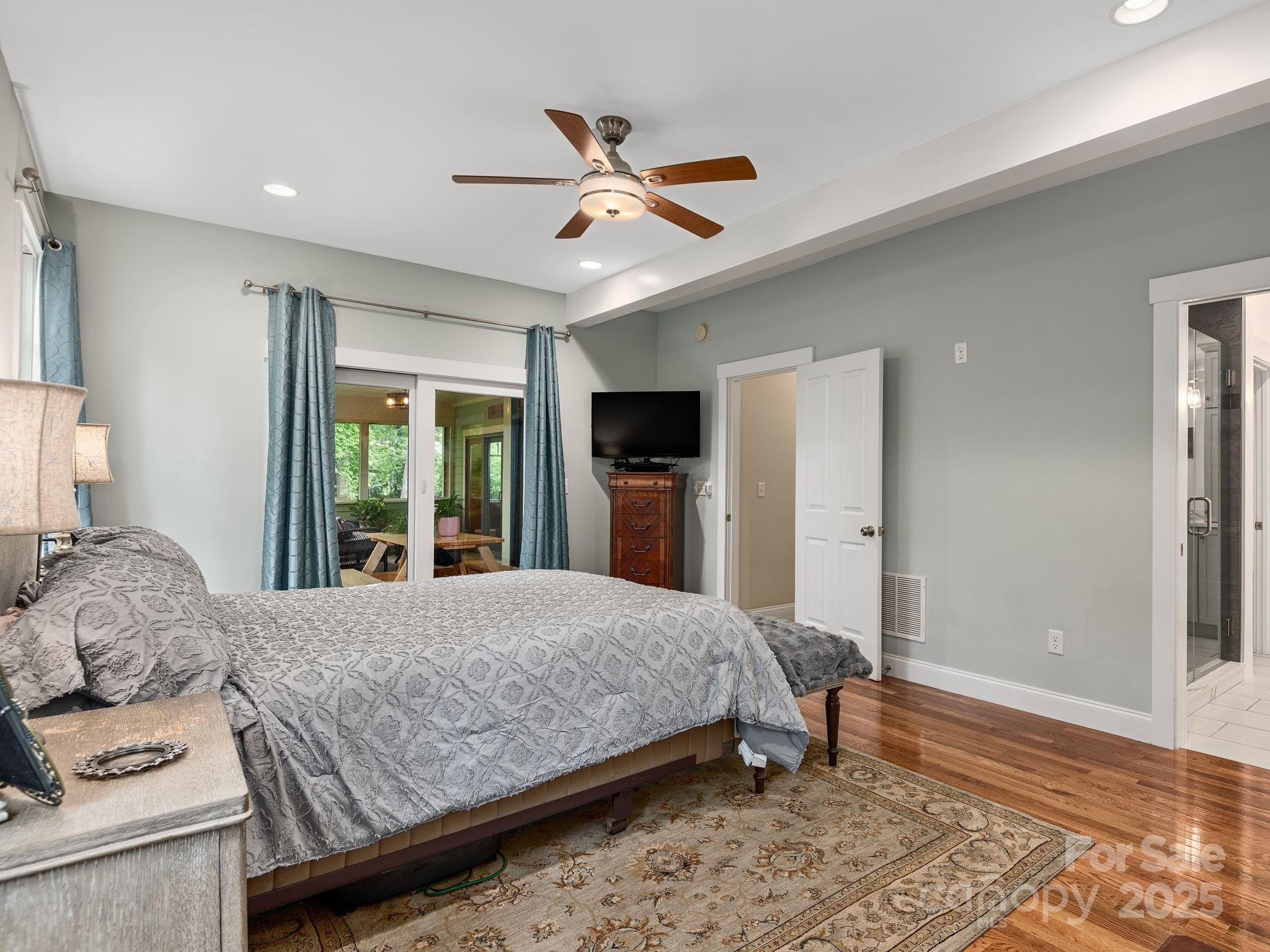 15 Avondale Road Asheville, NC 28803 - Photo 21 of 48 a bedroom with a large bed and a window