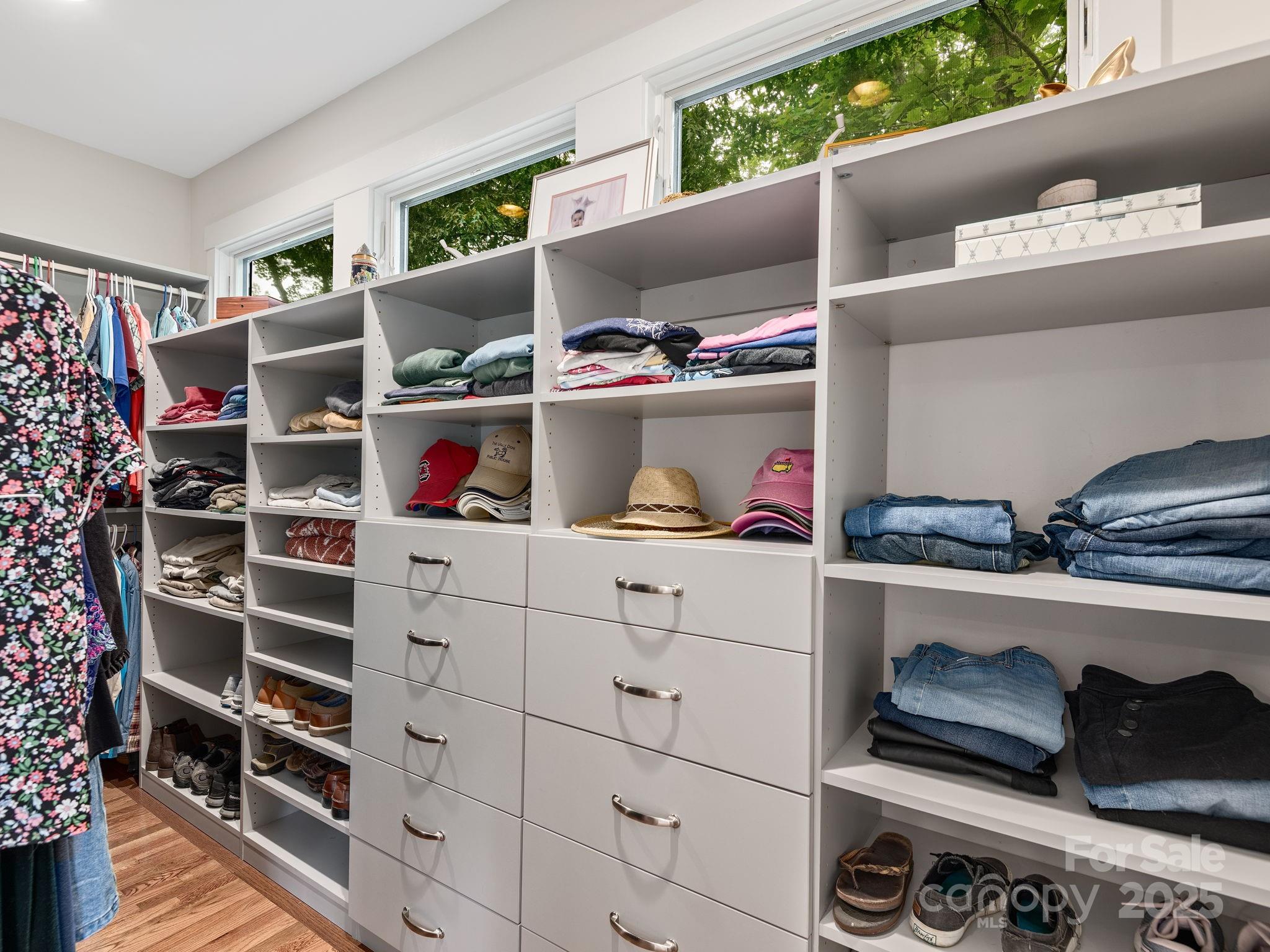 15 Avondale Road Asheville, NC 28803 - Photo 22 of 48 a kitchen with white cabinets and a wooden floor