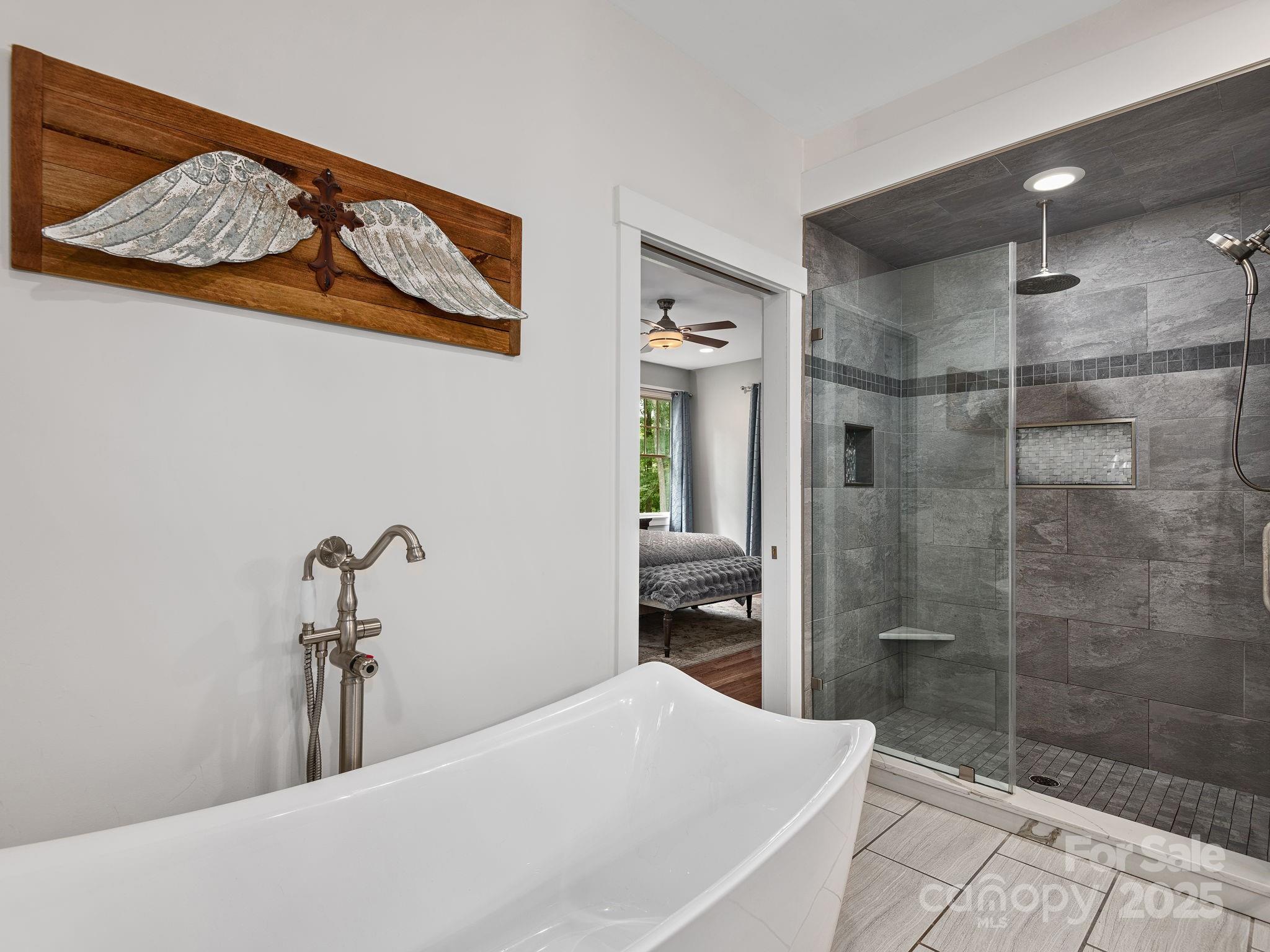 15 Avondale Road Asheville, NC 28803 - Photo 24 of 48 a bathroom with a bathtub and shower