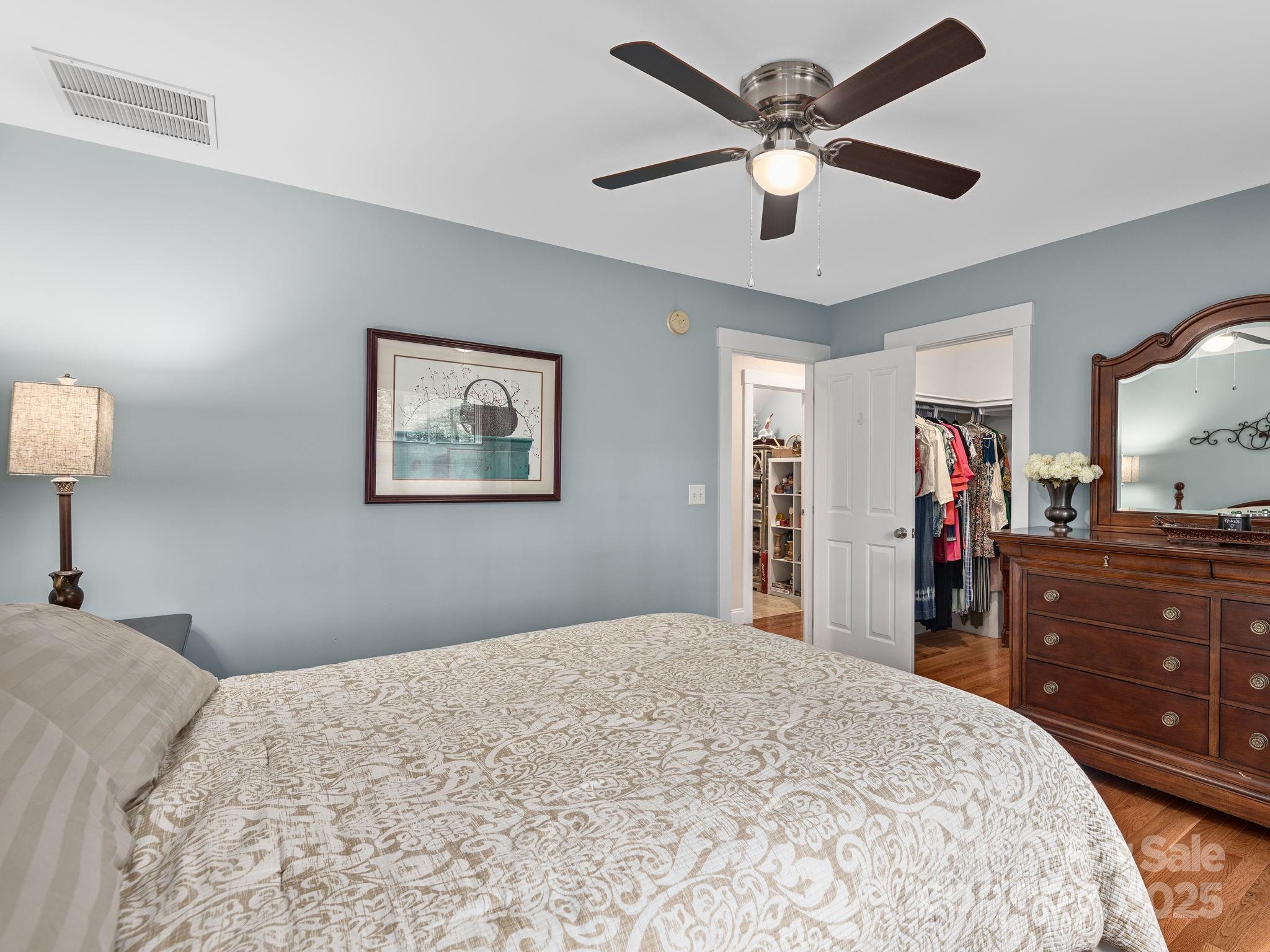 15 Avondale Road Asheville, NC 28803 - Photo 29 of 48 a bedroom with a bed and a dresser