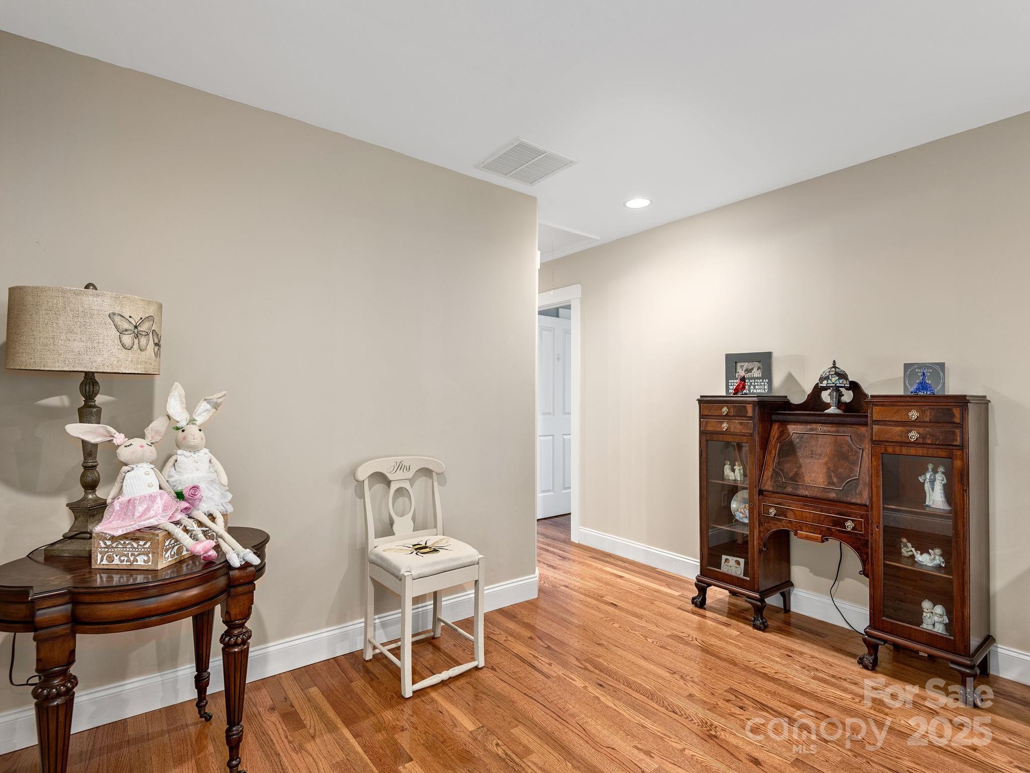 15 Avondale Road Asheville, NC 28803 - Photo 31 of 48 a view of a workspace with furniture and wooden floor