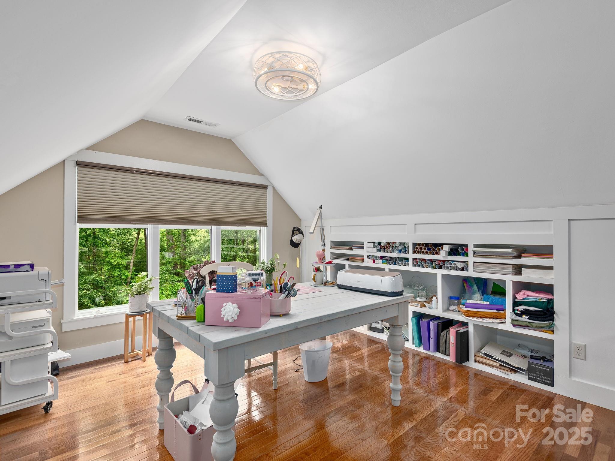 15 Avondale Road Asheville, NC 28803 - Photo 35 of 48 a living room with furniture and a flat screen tv
