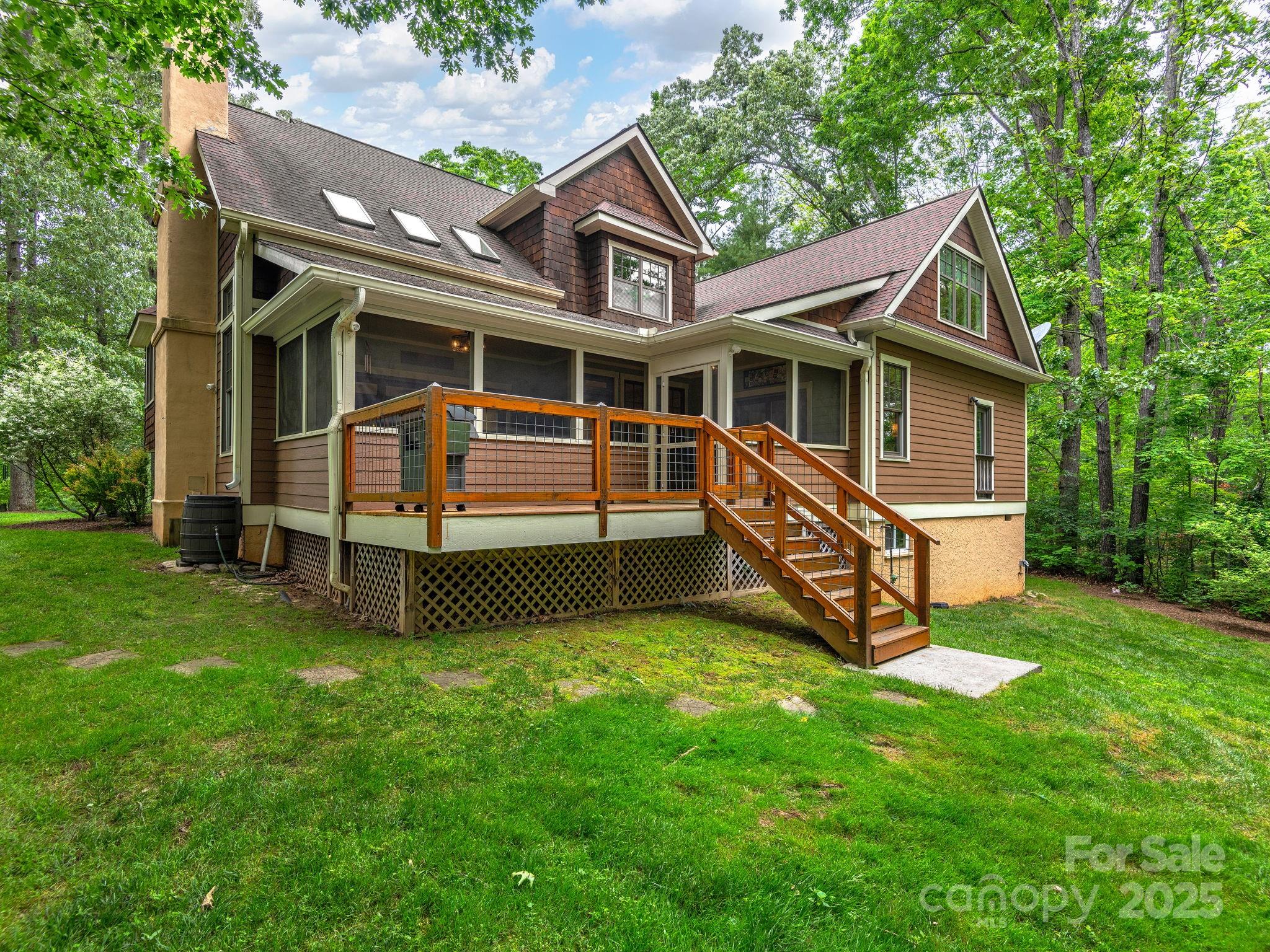 15 Avondale Road Asheville, NC 28803 - Photo 36 of 48 a view of a house with a yard and sitting area