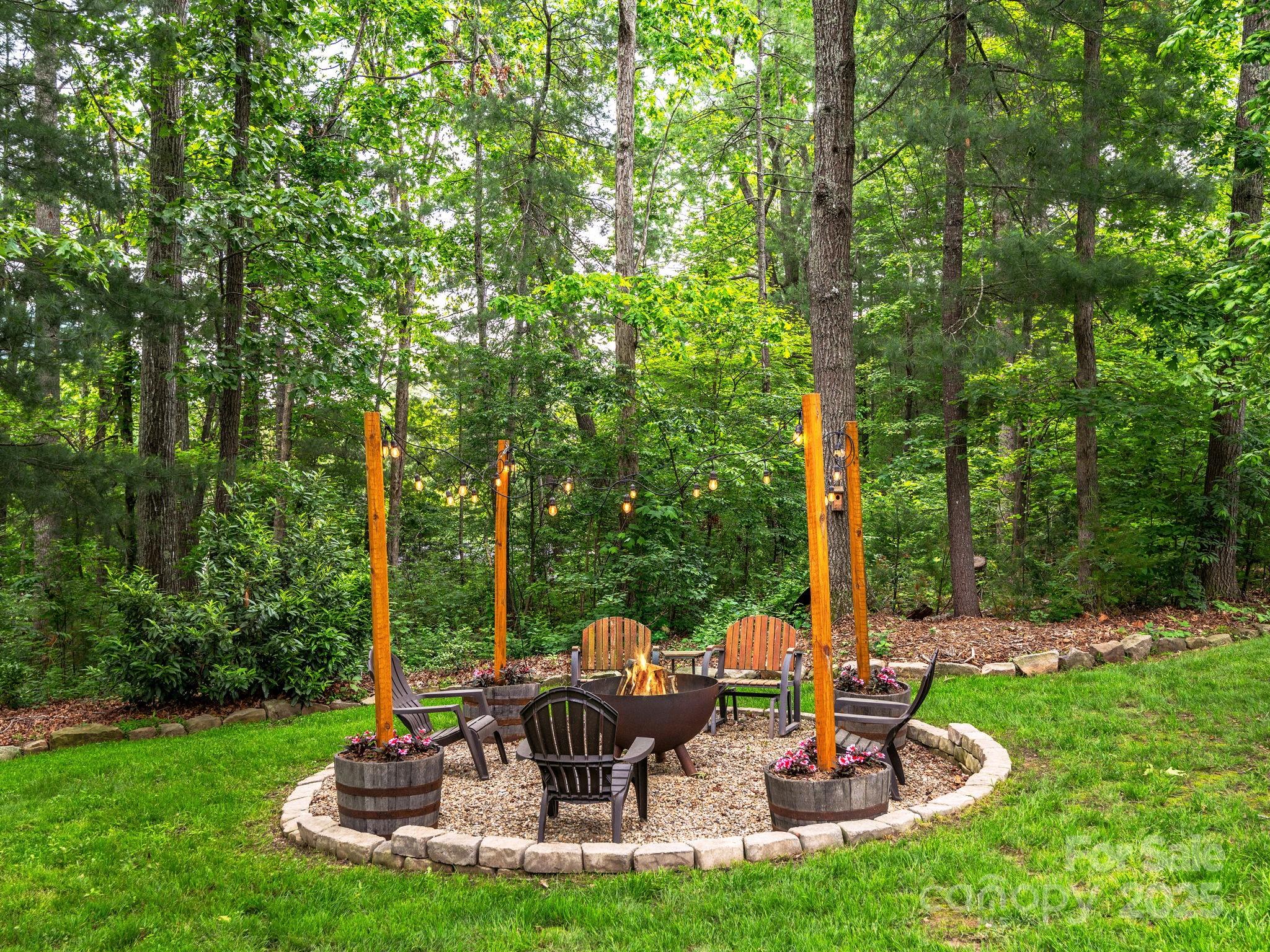 15 Avondale Road Asheville, NC 28803 - Photo 40 of 48 a view of a chair and table of the garden