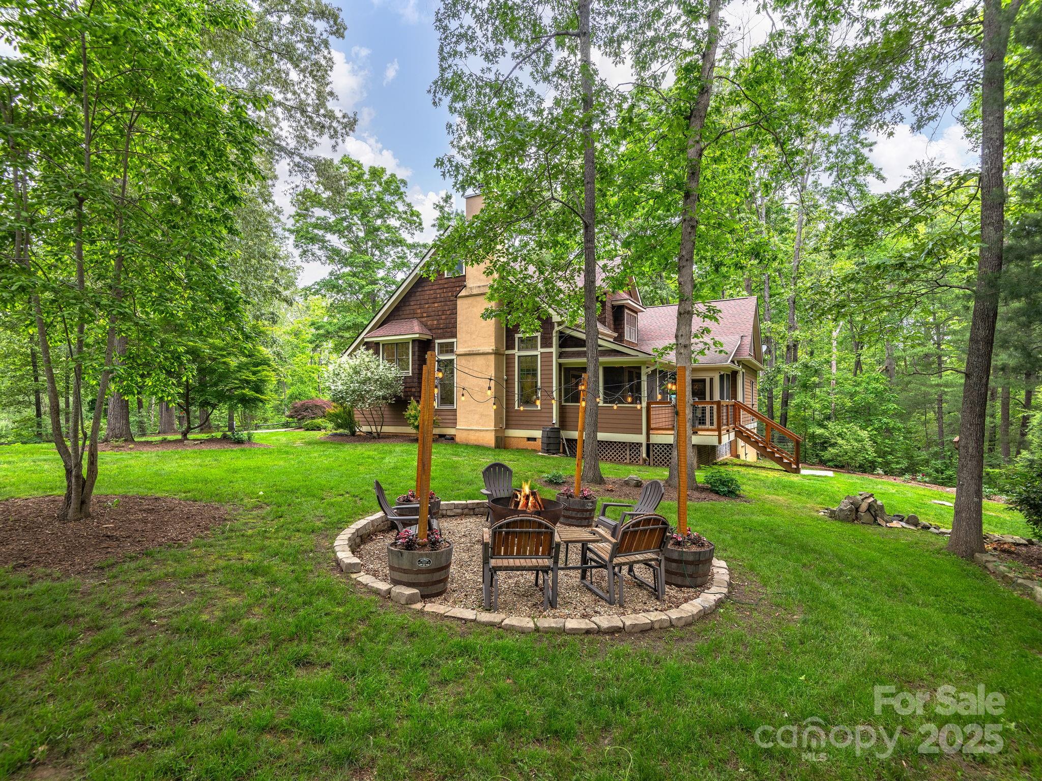 15 Avondale Road Asheville, NC 28803 - Photo 41 of 48 a view of a house with backyard porch and sitting area