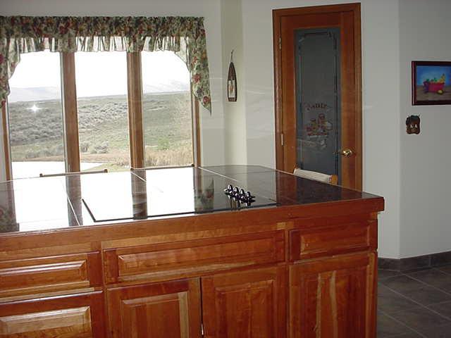 340 Black Hawk Road Yakima, WA 98908 - Photo 5 of 25 a living room with a large window and walk in closet