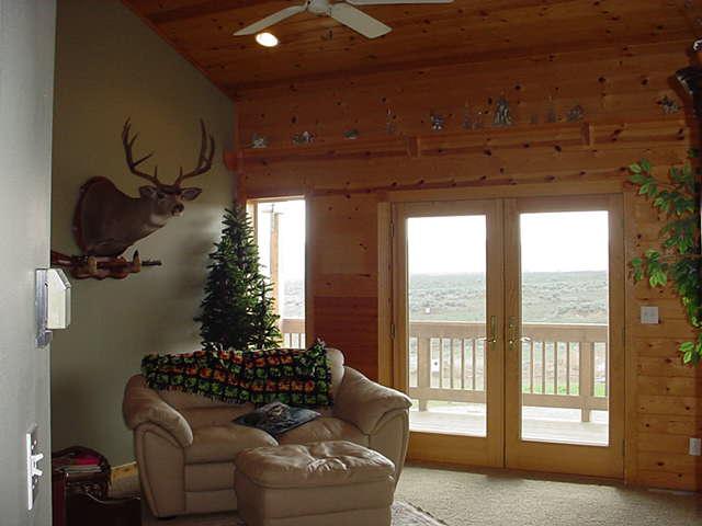 340 Black Hawk Road Yakima, WA 98908 - Photo 9 of 25 a living room with furniture and a large window