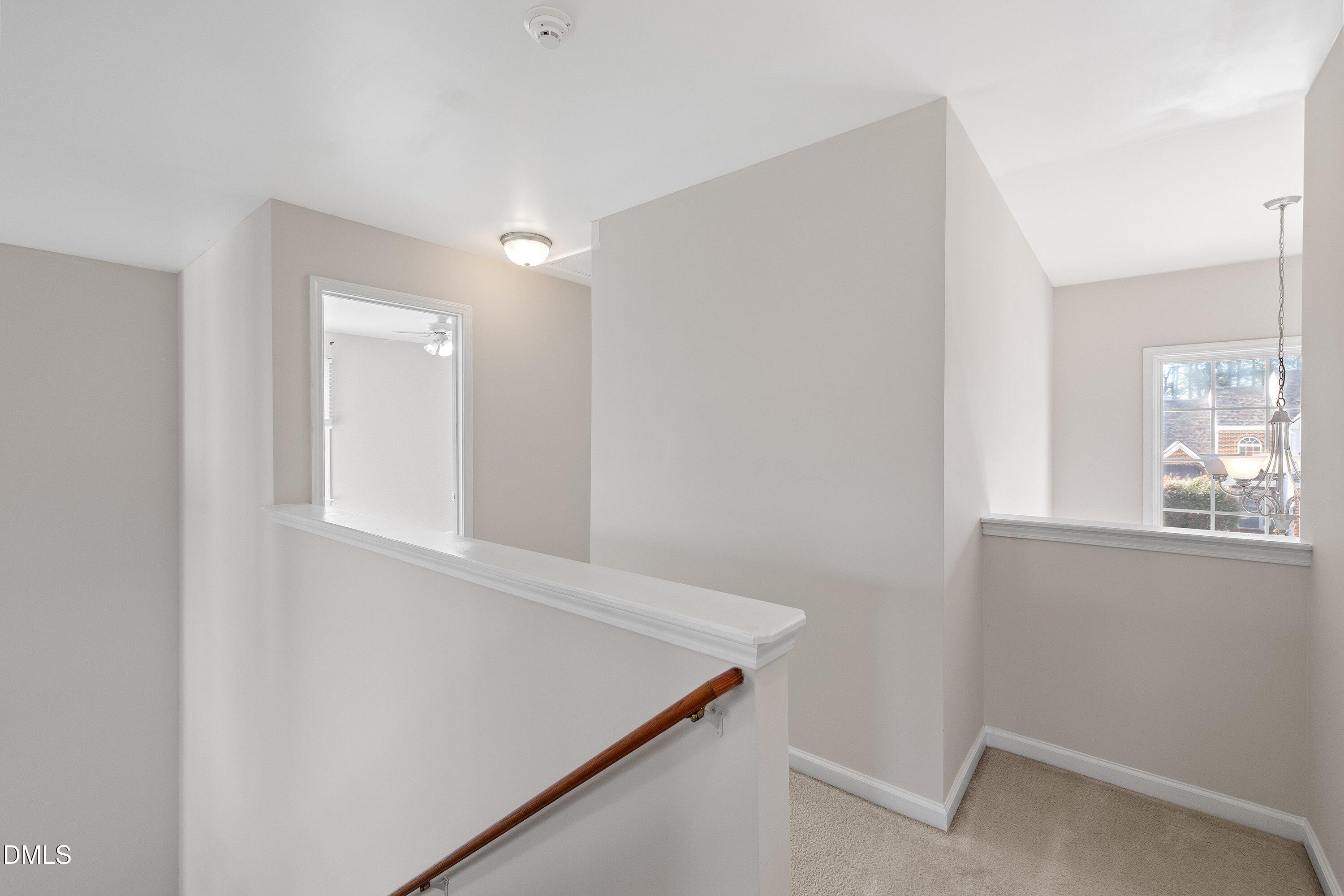 5717 Keowee Way Raleigh, NC 27616 - Photo 40 of 41 an empty room with windows