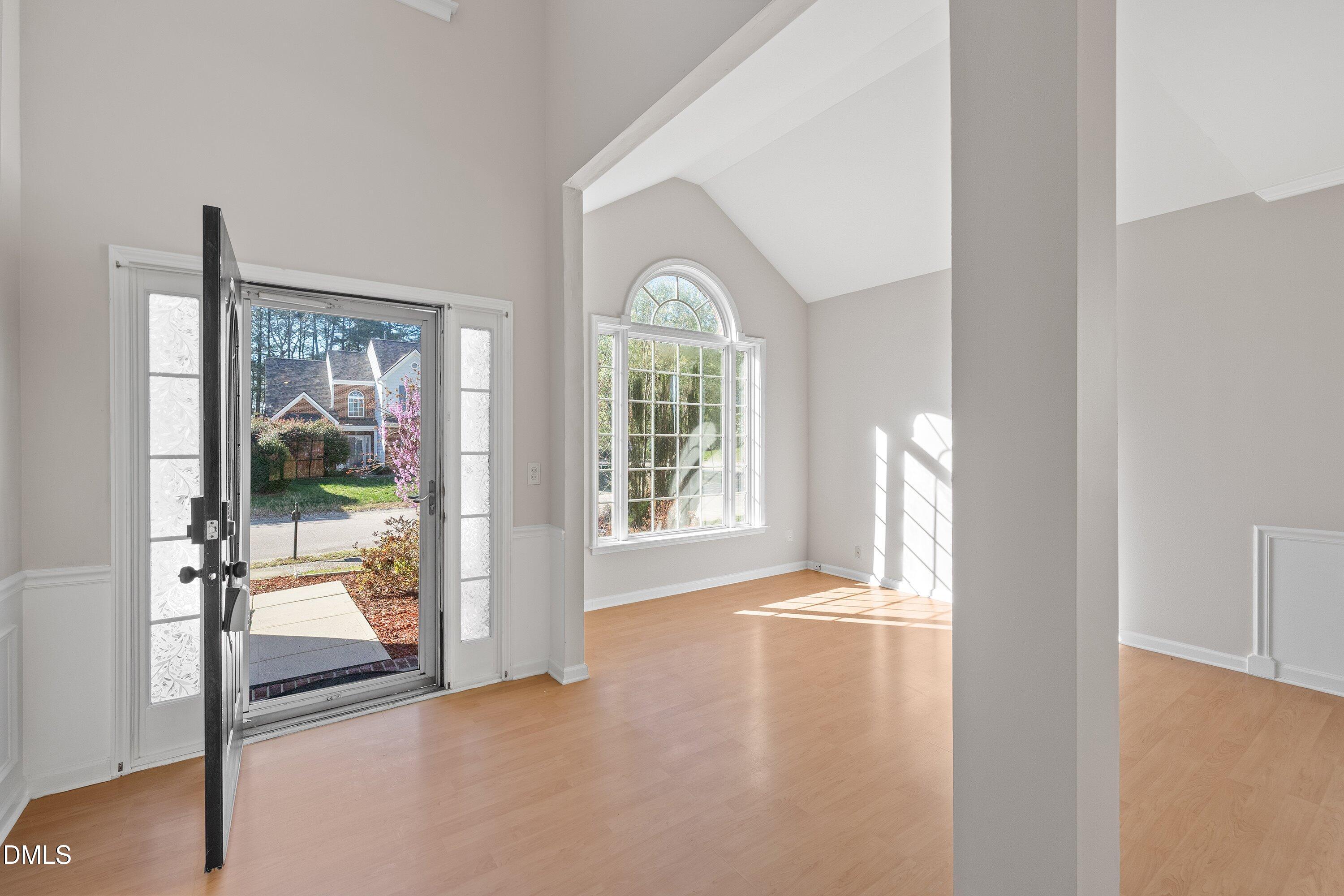 5717 Keowee Way Raleigh, NC 27616 - Photo 39 of 41 a view of a room with large windows