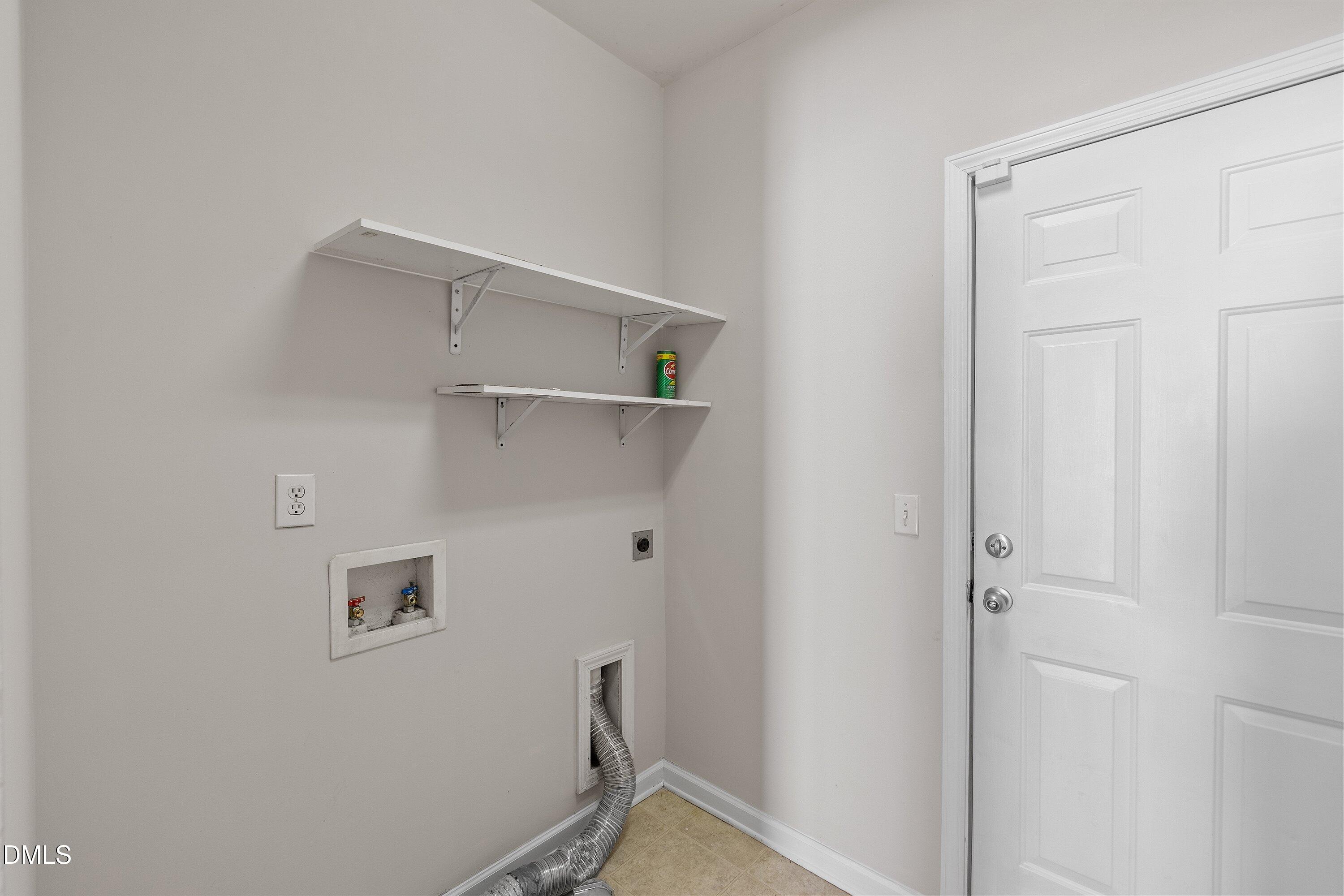 5717 Keowee Way Raleigh, NC 27616 - Photo 32 of 41 a view of small space with racks on the wall