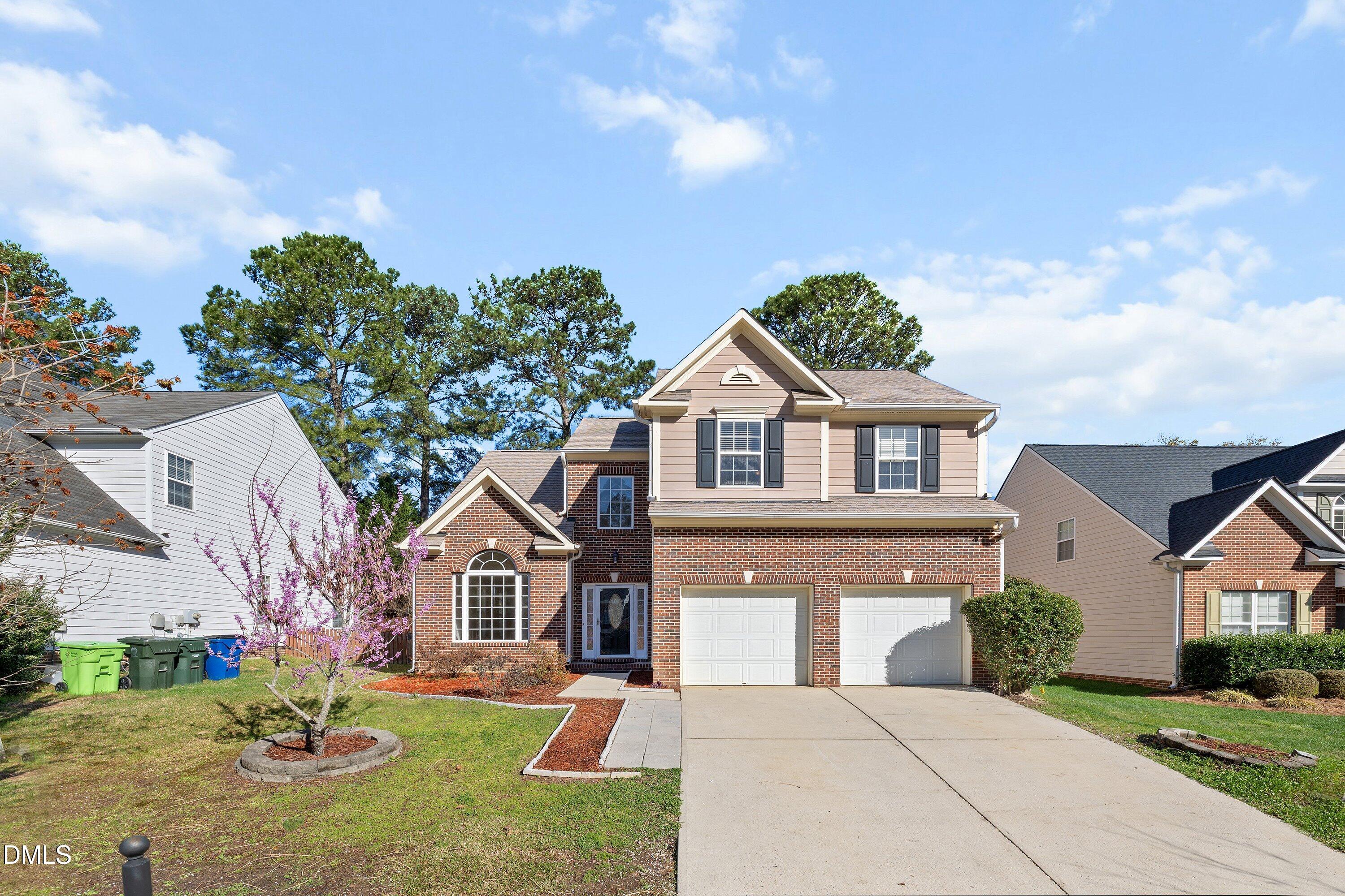 5717 Keowee Way Raleigh, NC 27616 - Photo 37 of 41 a front view of a house with a yard