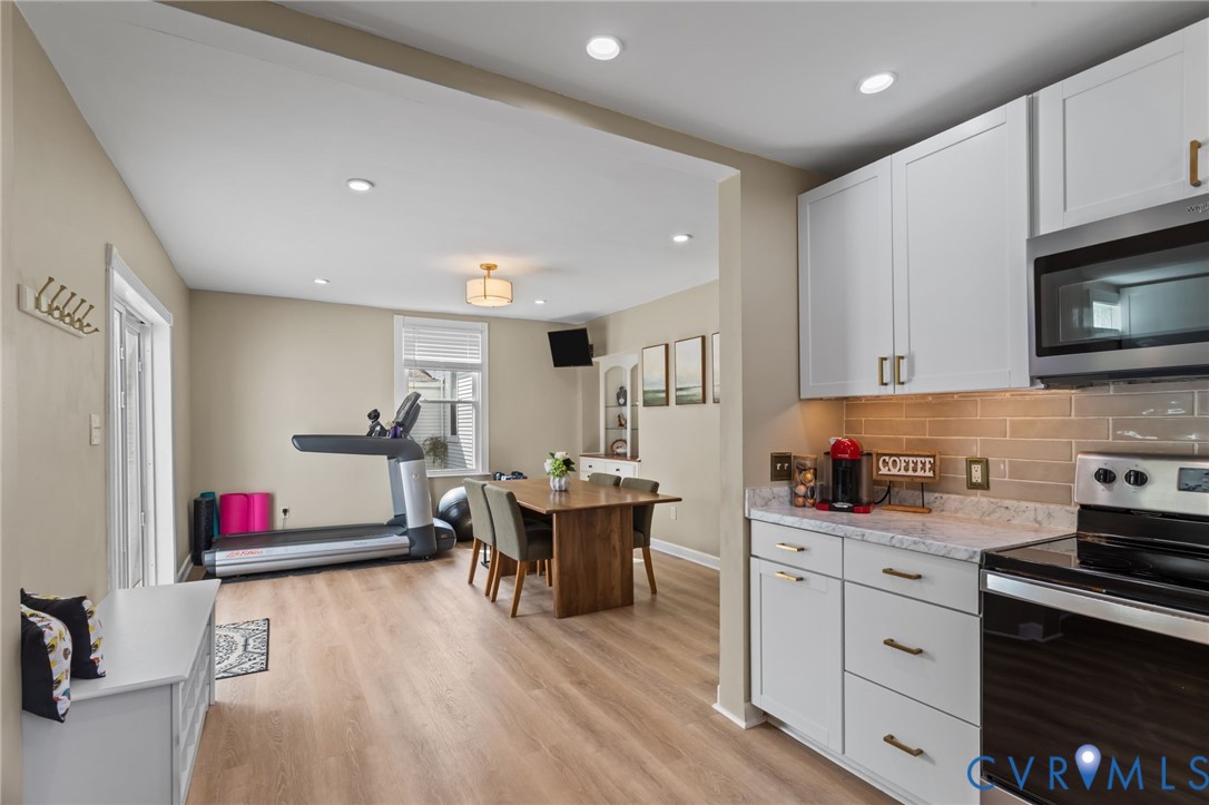 6101 River Road Petersburg, VA 23803 - Photo 14 of 37 Kitchen with stainless steel appliances, white cab