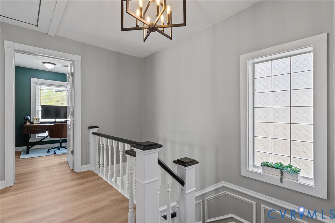 6101 River Road Petersburg, VA 23803 - Photo 19 of 37 Hallway with an upstairs landing, a chandelier, an