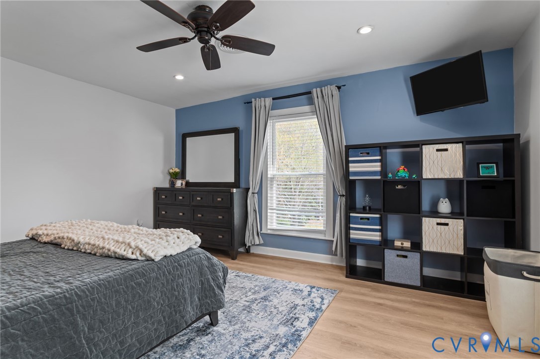 6101 River Road Petersburg, VA 23803 - Photo 23 of 37 Bedroom featuring LVP floors, ceiling fan, recesse