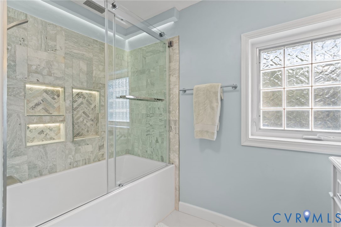 6101 River Road Petersburg, VA 23803 - Photo 25 of 37 Upstairs full bathroom with double vanity, a showe