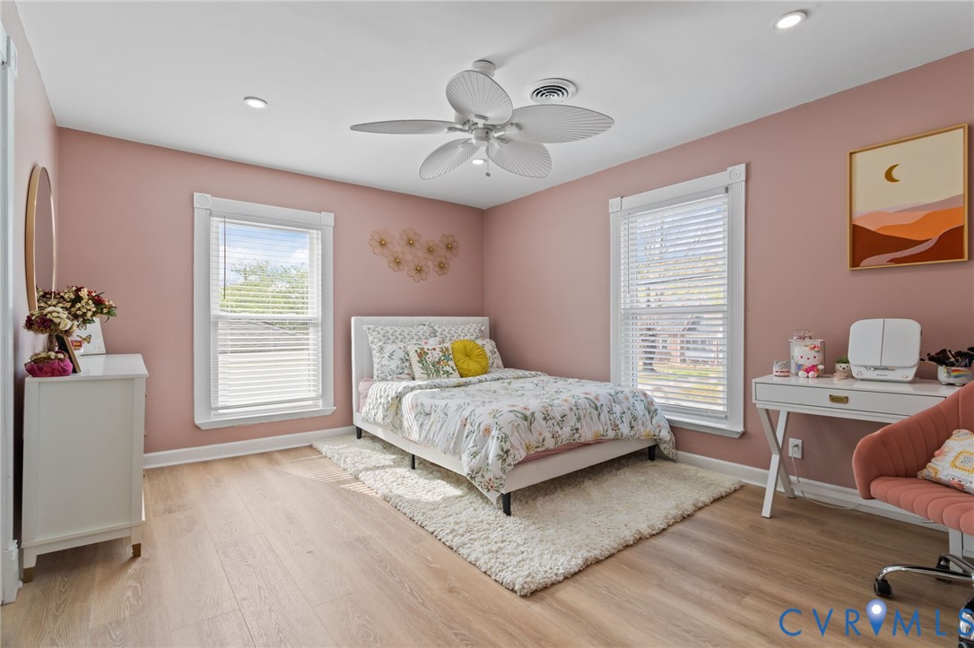 6101 River Road Petersburg, VA 23803 - Photo 27 of 37 Bedroom with LVP floors, multiple windows, 2 door