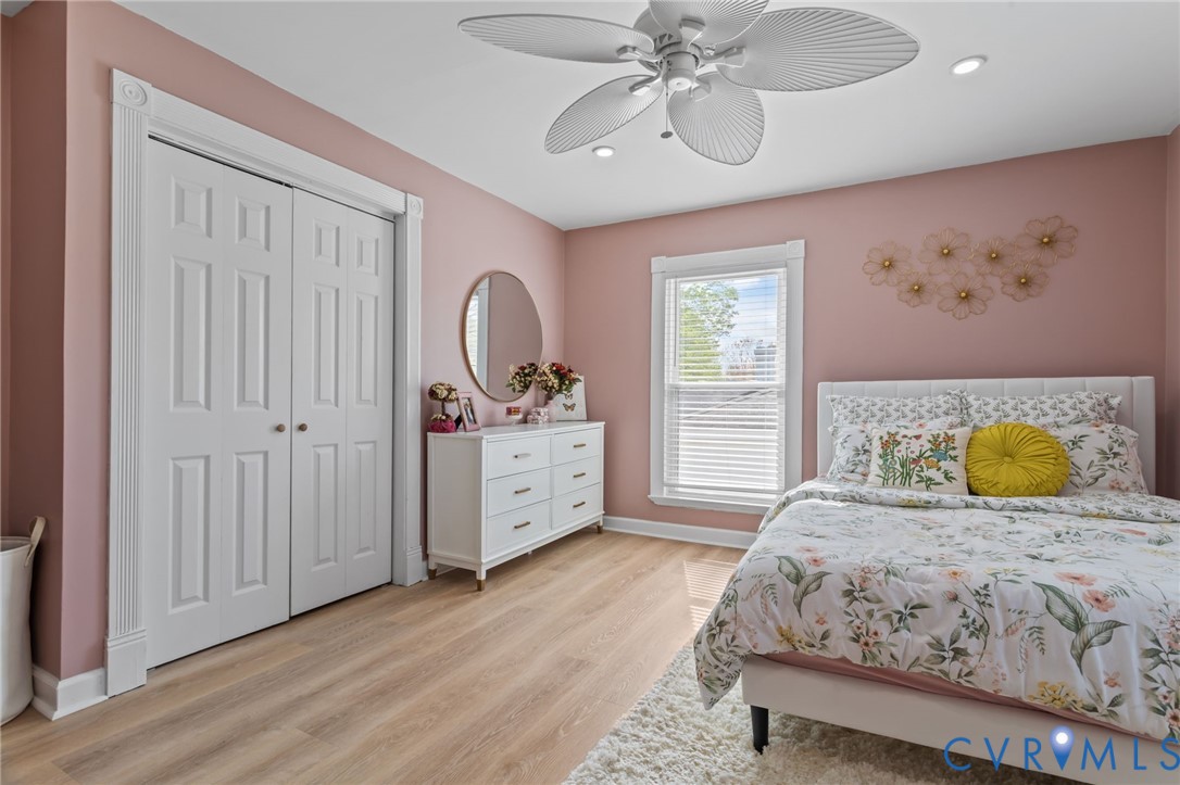 6101 River Road Petersburg, VA 23803 - Photo 28 of 37 Bedroom with LVP floors, multiple windows, 2 door