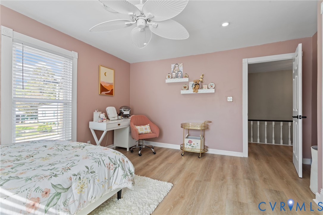 6101 River Road Petersburg, VA 23803 - Photo 29 of 37 Bedroom with LVP floors, multiple windows, 2 door