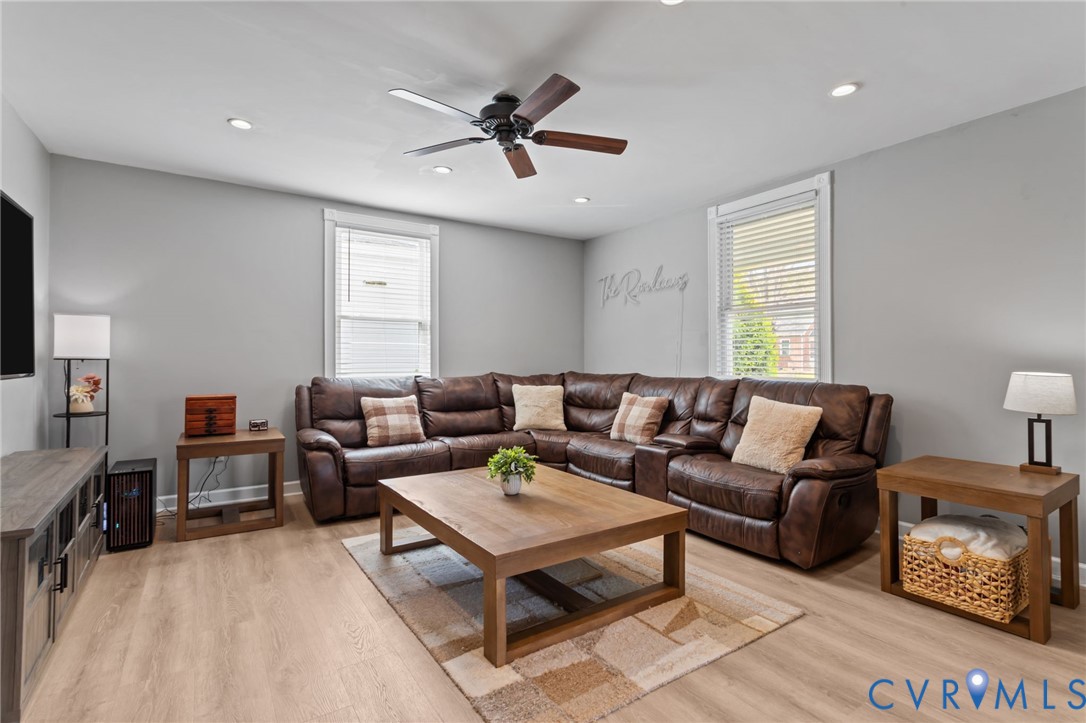 6101 River Road Petersburg, VA 23803 - Photo 5 of 37 Living room featuring LVP floors, a ceiling fan, a