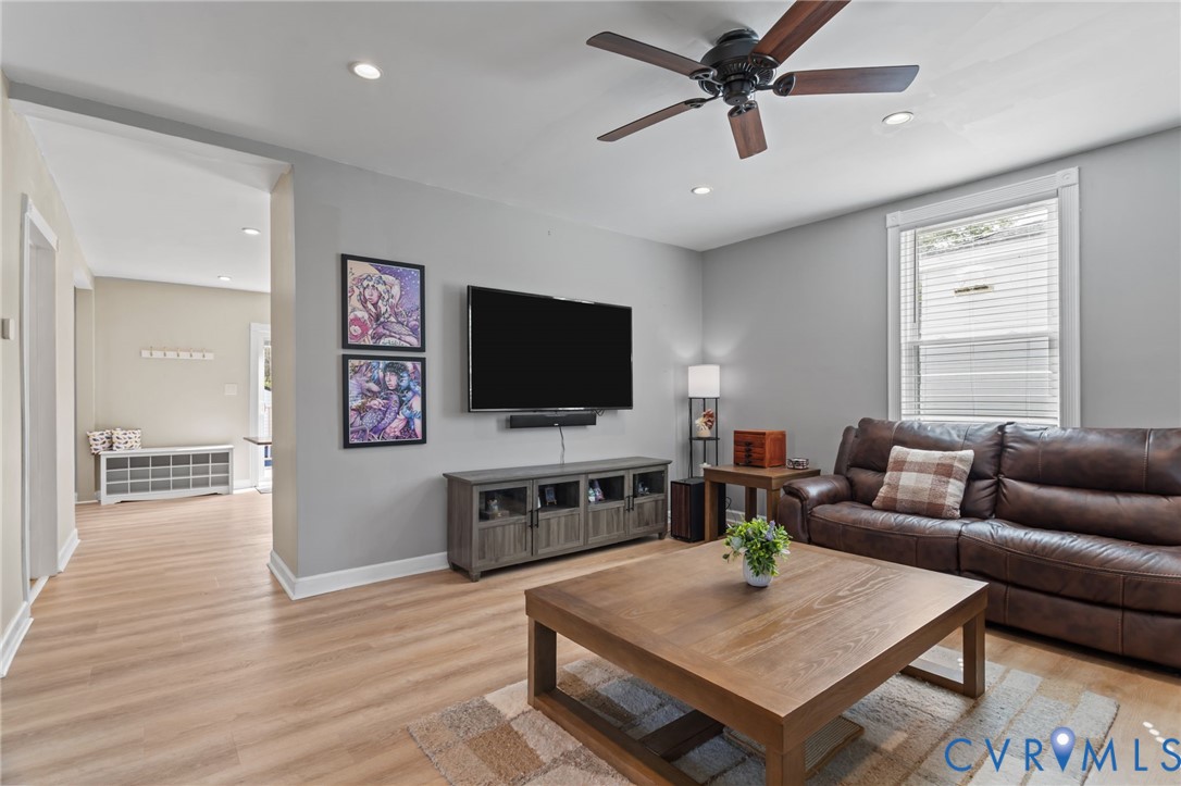 6101 River Road Petersburg, VA 23803 - Photo 7 of 37 Living room featuring LVP floors, a ceiling fan, a
