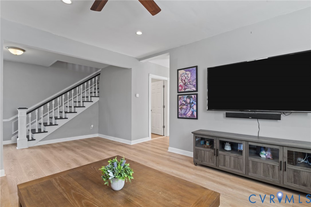 6101 River Road Petersburg, VA 23803 - Photo 8 of 37 Living room featuring LVP floors, a ceiling fan, a