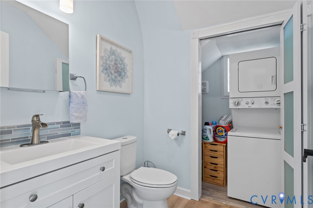 6101 River Road Petersburg, VA 23803 - Photo 10 of 37 Half bathroom featuring vanity, light wood-style f
