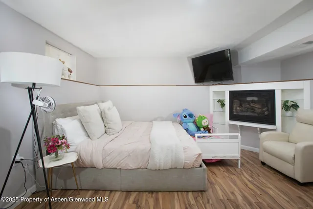 a living room with a couch and a flat screen tv