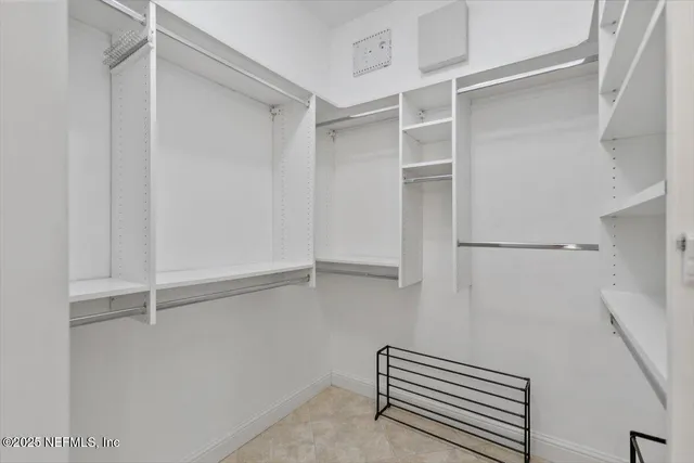 a view of an empty walk in closet