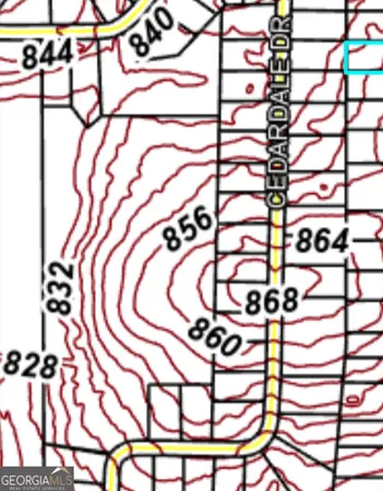 a view of backyard with green space