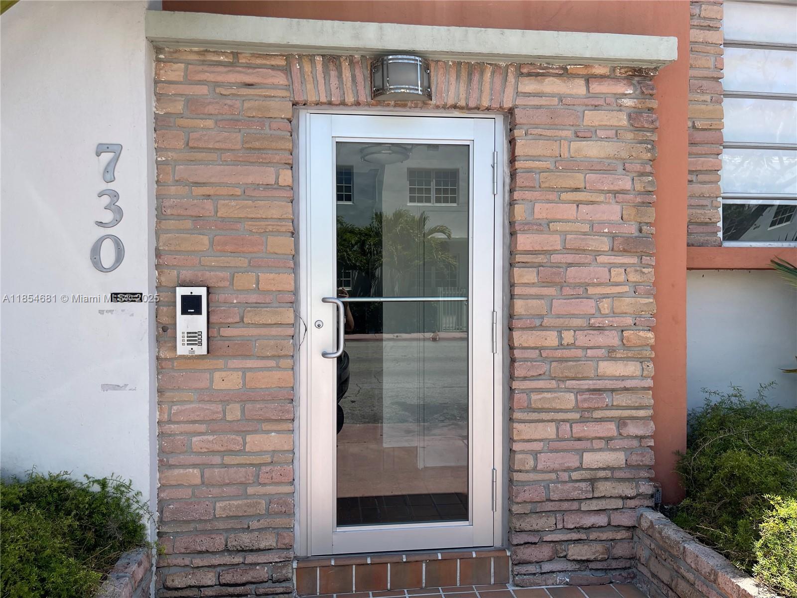 730 12th Street, Unit 10 Miami Beach, FL 33139 - Photo 3 of 12 view of a brick house