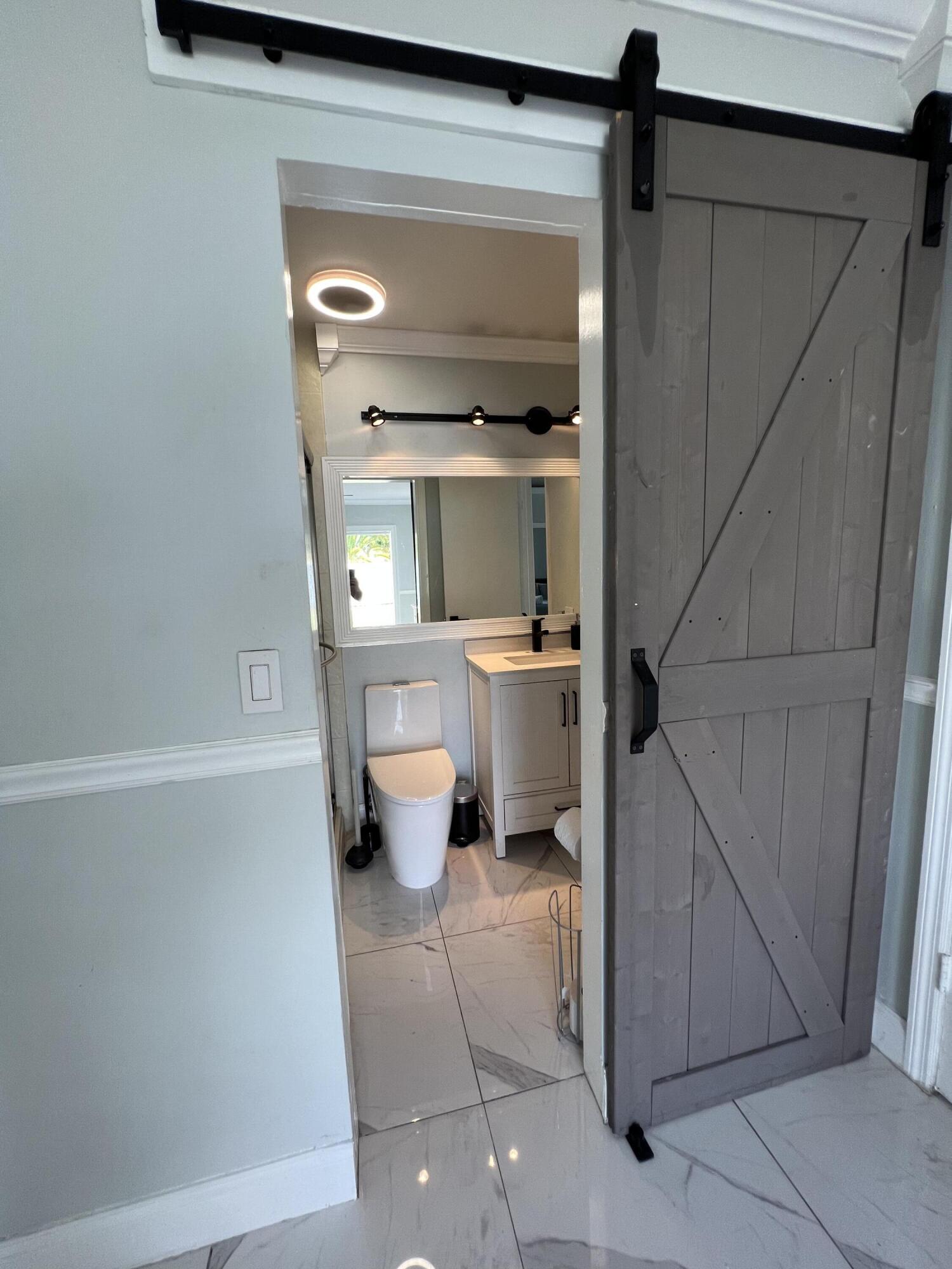 2465 Southridge Road Delray Beach, FL 33444 - Photo 18 of 65 795C5B6B-2979-44B8-9020-C1DD4F6FD54B